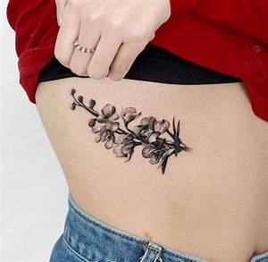 Stunning Floral Rib Tattoos: an Exquisite Art Form
